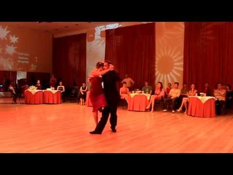  Fausto Carpino  and  Stephanie Fesneau  are  dancing  to  a  tango  at  Kiev International Tango Festival  in  2014