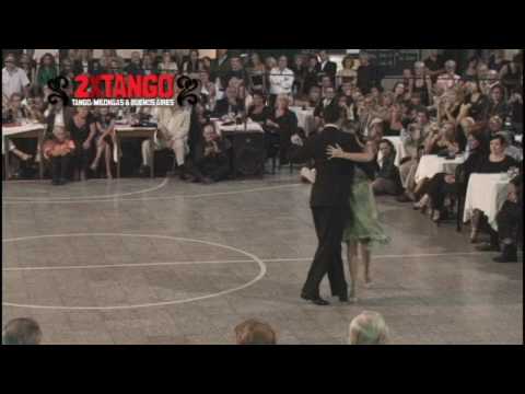  Maria Blanco  and  Roberto Zuccarino  are  dancing  to  the  tango  "  Una Emocion  "