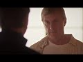Cobra Kai 6x01 Johnny Loses His Dojo Students Make New Logo
