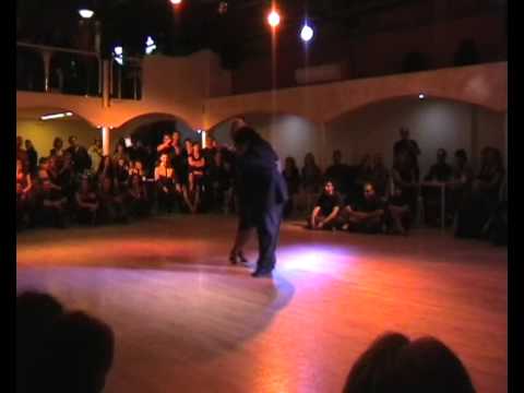  Alejandra Mantinan  and  Aoniken Quiroga  are  dancing  to  the  milonga  "  Milonga De La Puteada  "