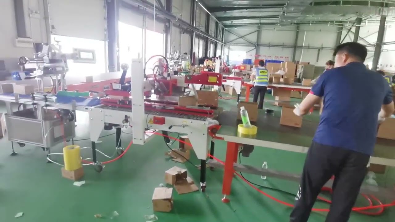 3-step automatic packaging line case erector bottom sealer labeler Japan