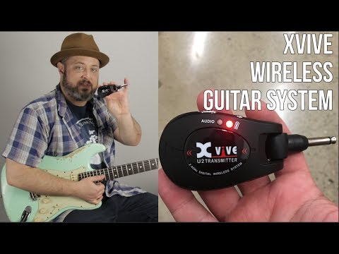 Wireless Guitar System - Xvive - Play Guitar Without the Mucky Muck!