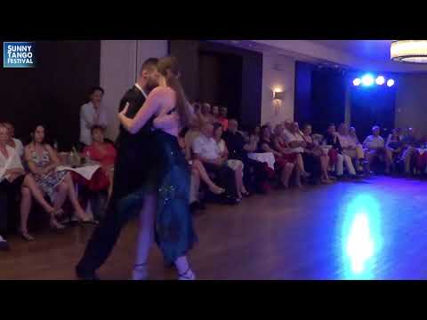  Giannis Sapatoris  and  Lydia Dunez  are  dancing  to  the  vals  "  Pobre Flor  "  by  Alfredo De Angelis  at  Sunny Tango Festival  in  2019