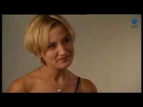 Promo frame with cast walking through St Kilda streets—music-driven montage energy