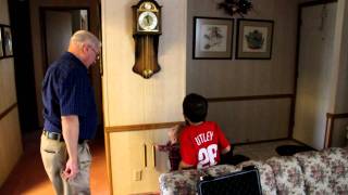 Milo Investigating Grandpa's Grandfather Clocks