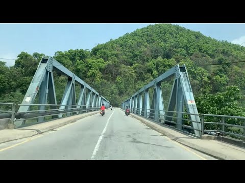 Windscreen View of Nepal’s Stunning Iron Bridge 