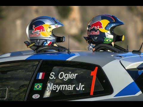 Brazilian football star Neymar Jr. co-drives with Ogier 2014 Spain