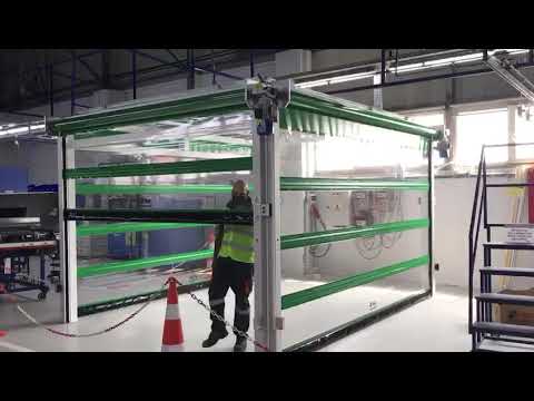 transparent rapid roll up door system designed for industrial facilities and production areas requiring visibility