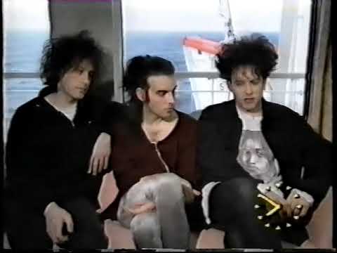The Cure 15 may 1992 UK tv 'morning' : report on QE2 + interview + live USA