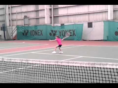 Six year old practicing her forehand (November 2011)
