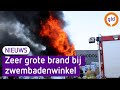 Zeer grote brand bij zwembadenwinkel, enorm veel rookontwikkeling
