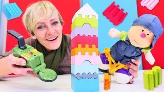 Spielzeugvideo für Kinder - Nicole und Hans bauen einen Turm aus Bauklötzen