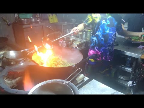 amazing wok skills! cooking with extreme  powerful fire