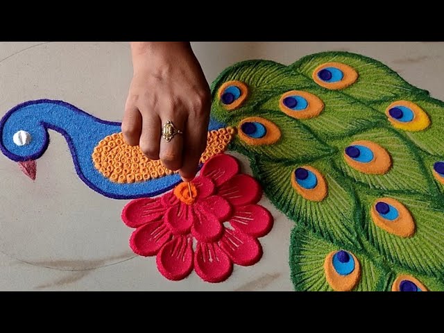 Peacock rangoli design by sangeeta