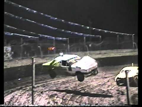 Massive speedway roll over