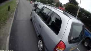 Idiotic overtake on roundabout exit - Y335OAW