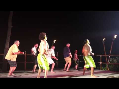 Men dance hula with Aloha