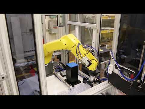 Robotic medical tray handling system