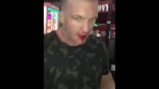 WTF! Crazy Guy swings on Adrien Broner in the street