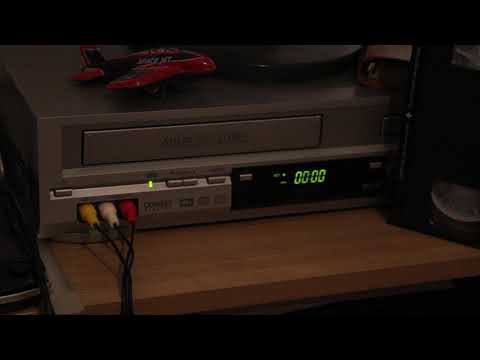 Free Stock Video - Inserting a VHS cassette into a VCR - Best Stock Footage