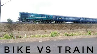 preview picture of video 'Ever seen a bike racing with passenger train? must see the shoking result !!'