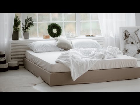 Part of a video titled EASY DIY Bed Frame - How to Make a Wooden Bed Frame! - YouTube