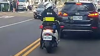 警察在旁邊，還想違規？乖乖的騎回去吧！