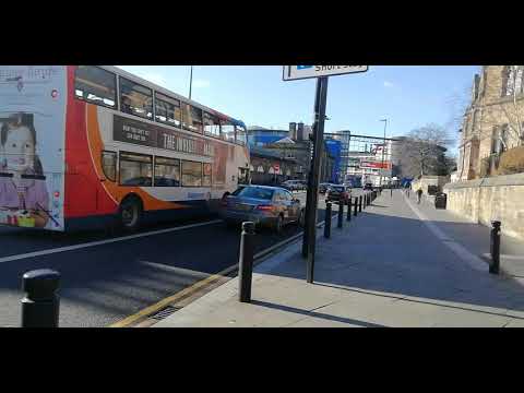 Go North East 54 and Stagecoach 1 passing Central Station (27/02/2020)