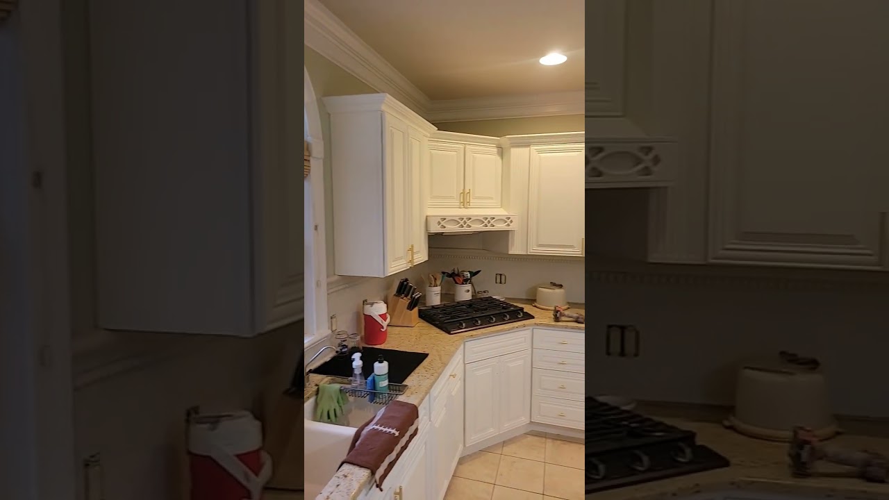 White Kitchen Cabinets with Gold hardware