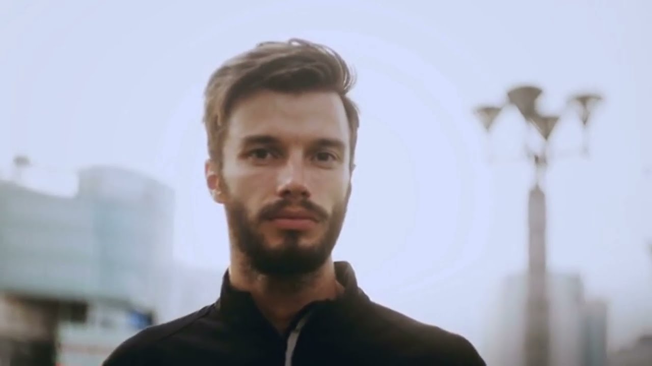 portrait of bearded man looking into camera close up caucasian handsome male beard face panning righ