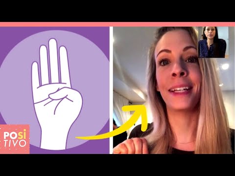 Donna chiede aiuto con un segnale alla sua amica in webcam | Positivo