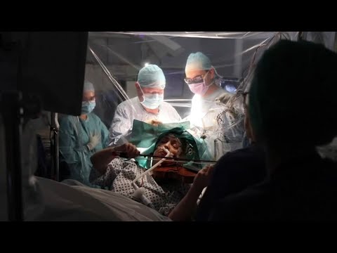 British woman plays violin while undergoing brain surgery | ABC7