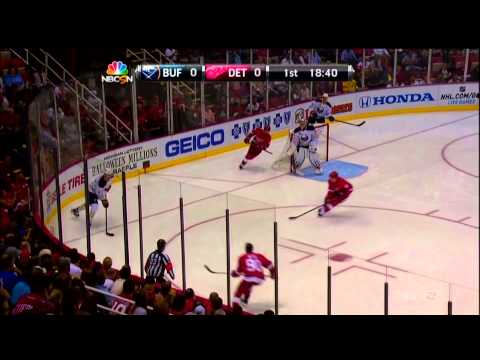 Stephen Weiss goes for the hit on Tyler Myers without his helmet Oct 2 2013