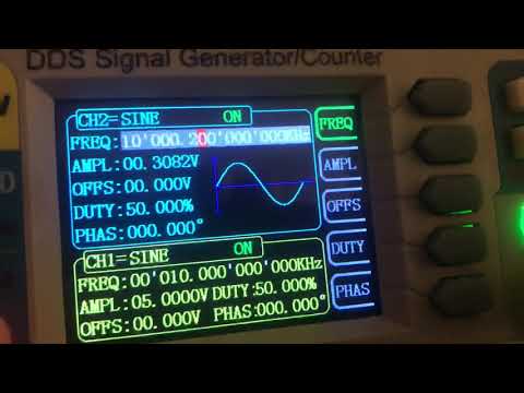 Kmoon  FY6800 frequency generator and counter zero beat with WWV on 10Mhz
