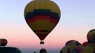 Hot Air Balloons Rising at Sunrise
