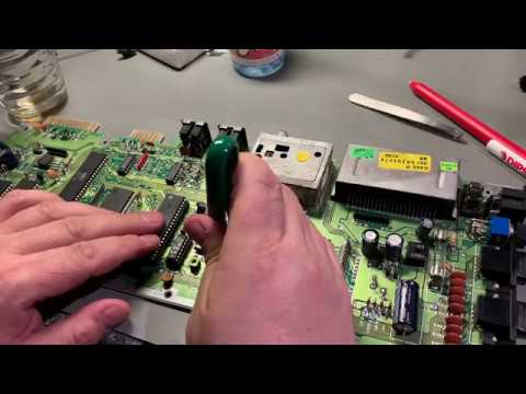 Commodore 64 repair - Broken SID chip, faulty power contact, cover damages, recapping and cleaning.