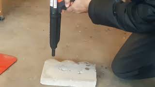 Ramset powder actuated nail gun in slow motion