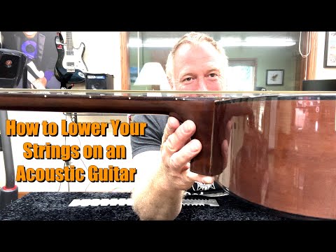How to Lower Strings on an Acoustic Guitar