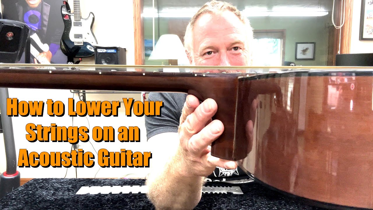 How to Lower Strings on an Acoustic Guitar
