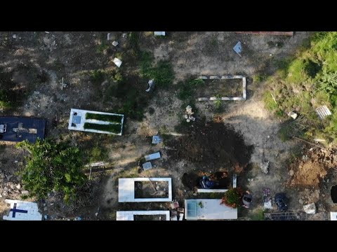 Colombia cemeteries 'cramped' after fighting kills at least 100 | AFP