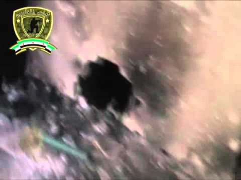 جثث جنود النظام الذين قتلوا بعد اقتحام لواء الفجر أحد الأبنية في مدينة داريا في ريف دمشق