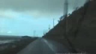 preview picture of video '[V0043] 020807 巨大ヘキサがある知床半島東岸の行き止まりで早朝の雨上がりの根室海峡沿いをＵターン Japanese country roads; Shiretoko'