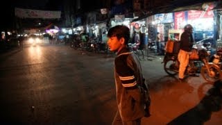 A boy fends for himself on the streets of Pakistan