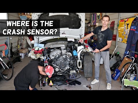 WHERE IS THE FRONT CRASH AIRBAG SENSOR ON A CAR