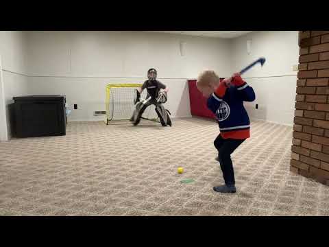 Amazing knee hockey mini stick goals from a 4 year old!