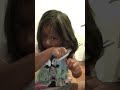 Adorable five year old caught cutting her own hair