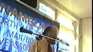 Allen Ginsberg reading poetry at a NAMBLA conference.