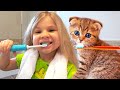 Diana and Roma take care of the kitten v Diana and Roma take care of the kitten v