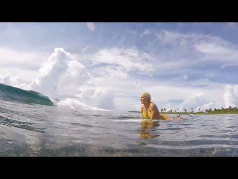 Tatiana Weston-Webb and Jesse Mendes surf the Maldives at COMO Maalifushi Resort with Tropicsurf