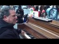 Mitch Woods plays piano on the streets of New York